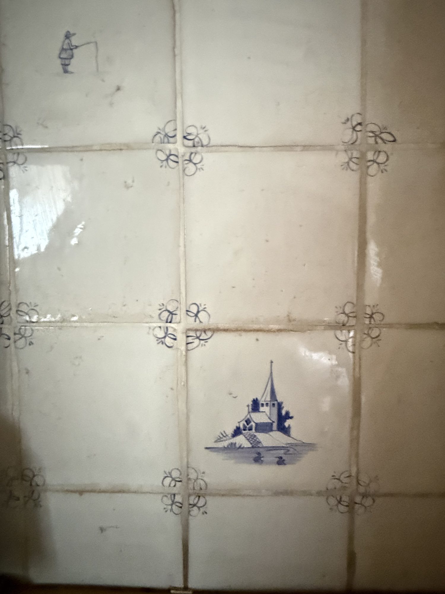 Sundial, old blue and white tiles