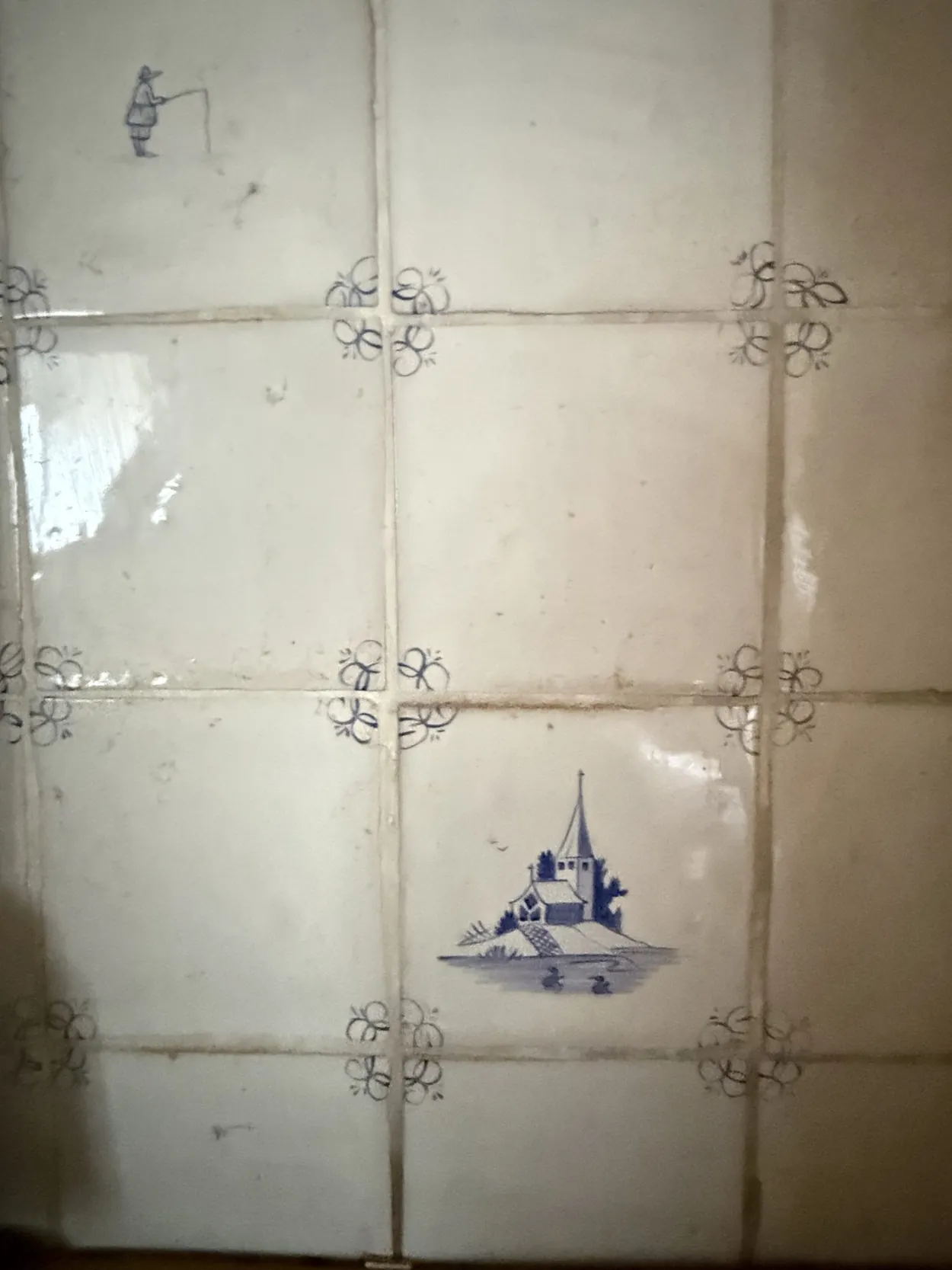 Sundial, old blue and white tiles