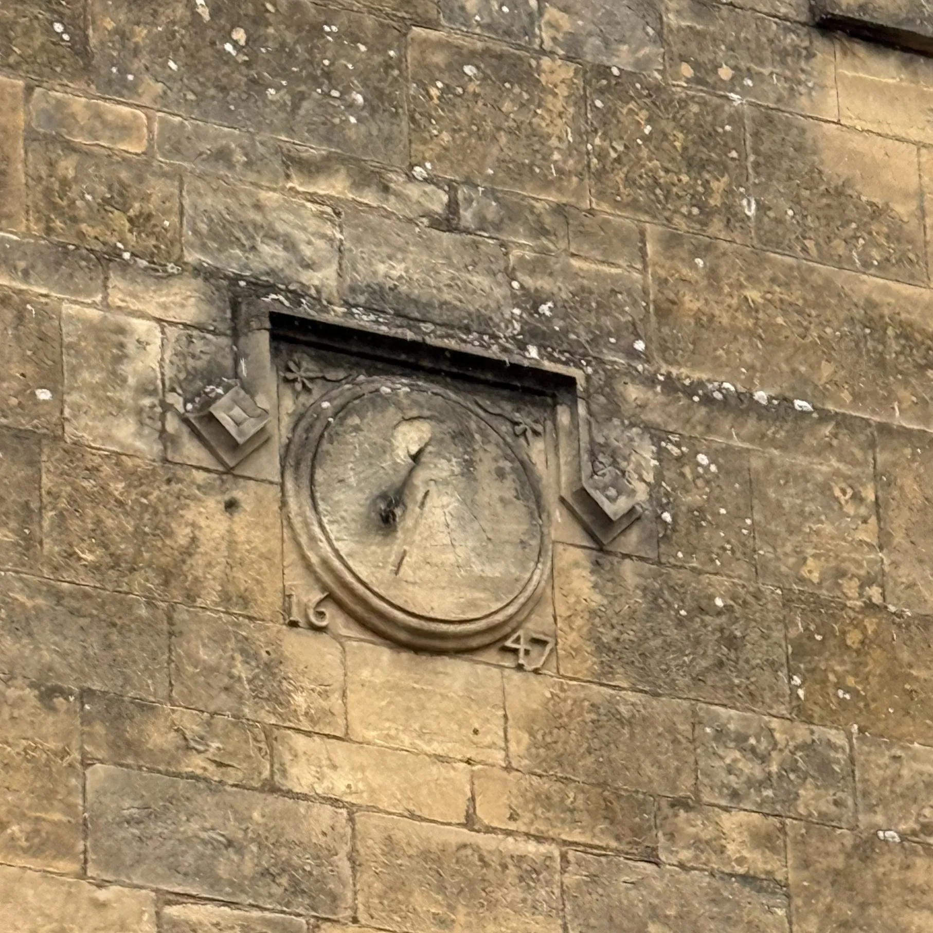 Sundial, the sundial on the front of the house, dated 1647