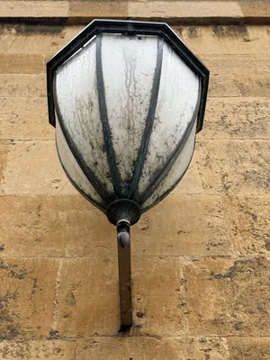 Sundial, a lantern on Cotswold stone