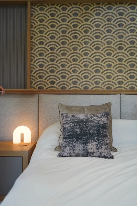 Suite Escape, detail, bouclé and the bedside lamp