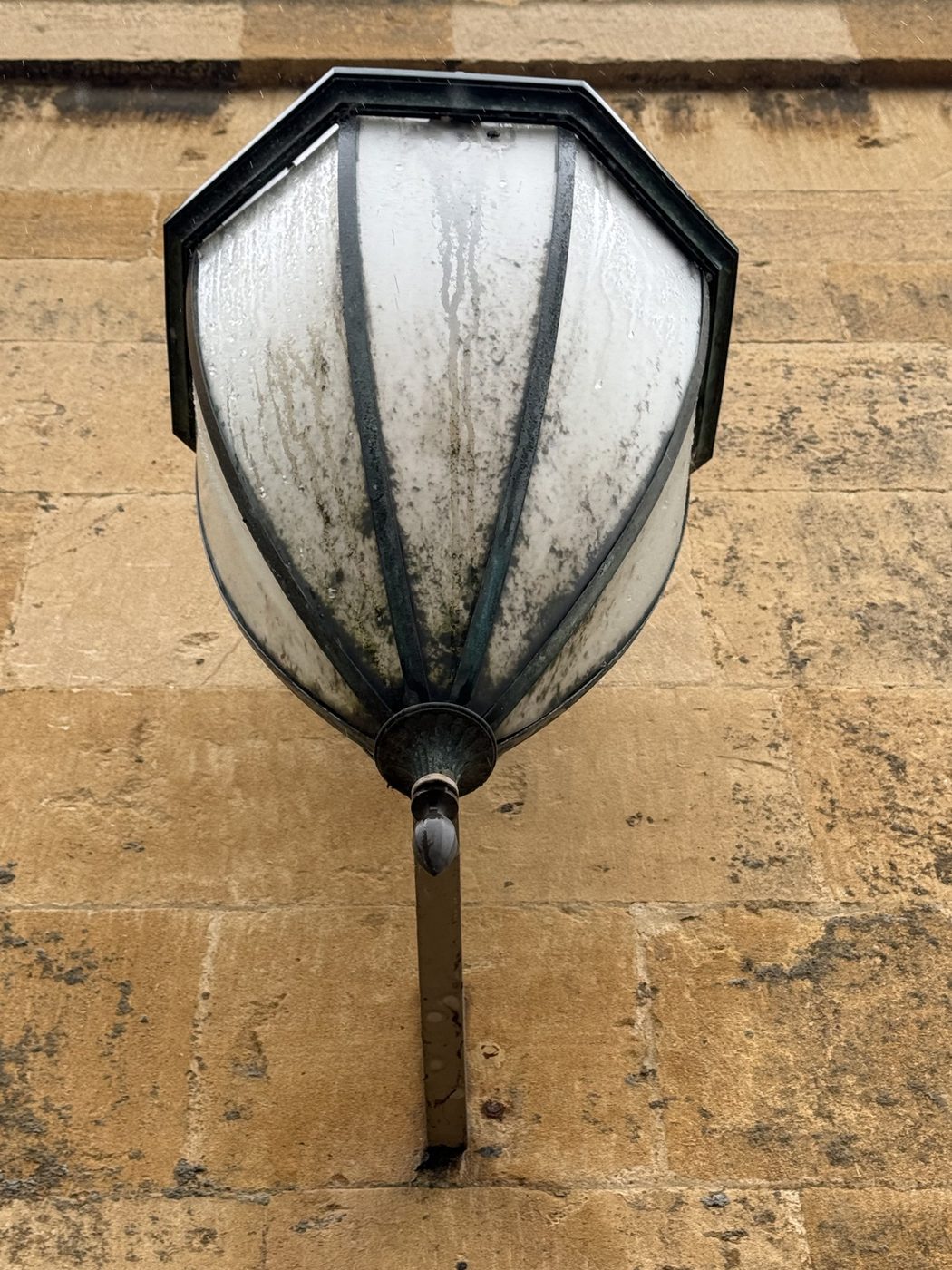 Sundial, a lantern on Cotswold stone