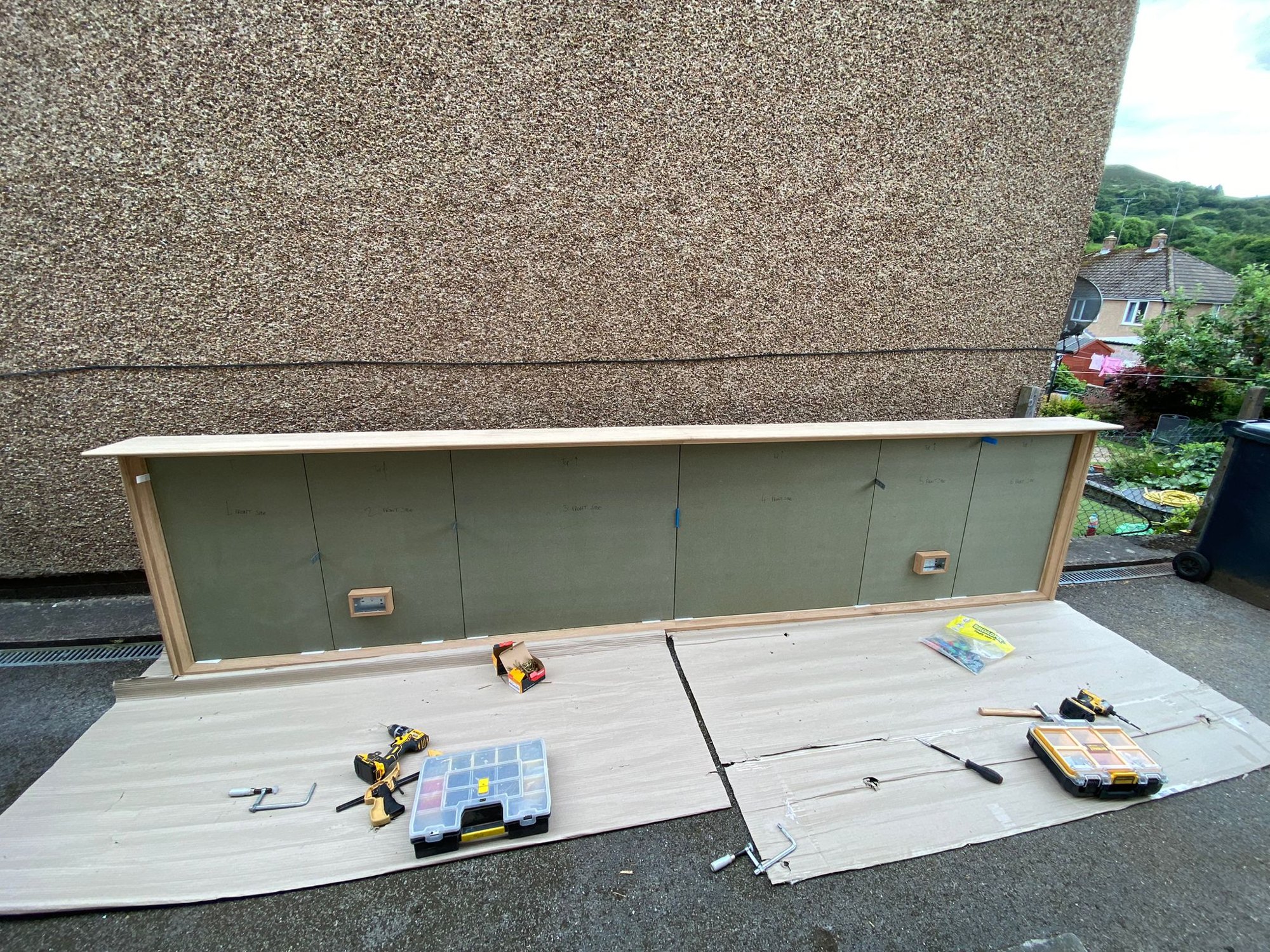 Suite Escape, The bed wall laid out in one piece before going in, the bedside light boxes cut in