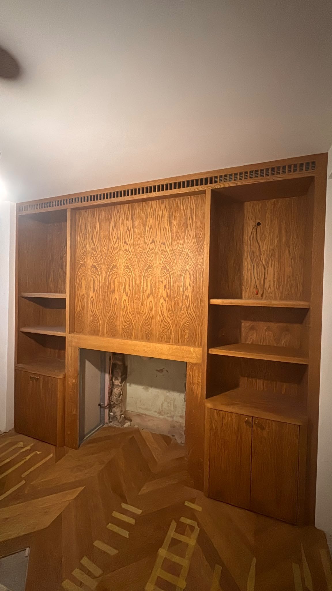 A Walk in the Park, The fireplace unit in place, before the fire and travertine surround went in